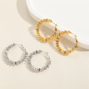 Modern geometric spring hoop earrings in gold and silver finish for women's fashion