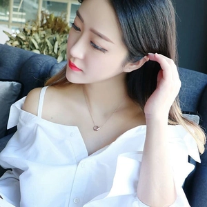 Elegant 18K rose gold plated titanium steel necklace with interlocking double ring pendant