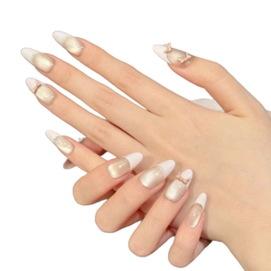 Pink ballet French press-on nails with 3D bows and champagne pearl almond design