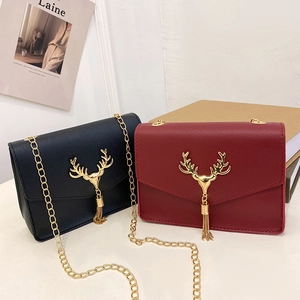 Elegant quilted chain shoulder bags with gold deer pendant in black and burgundy leather