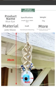 Detailed view of handmade Evil Eye wall hanging with blue glass pendant on twine