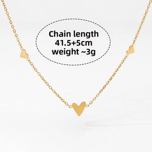 Detailed view of golden heart chain necklace with length 41.5+5cm and 3g weight