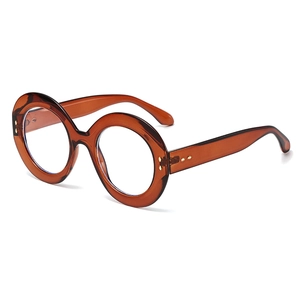 Oversized round brown transparent glasses frame with stylish gold rivet details