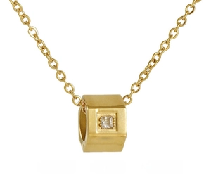 Detail of 18k gold plated stainless steel necklace with geometric square acrylic pendant