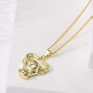 18K gold plated copper bull head pendant necklace with punk cuban chain on white background
