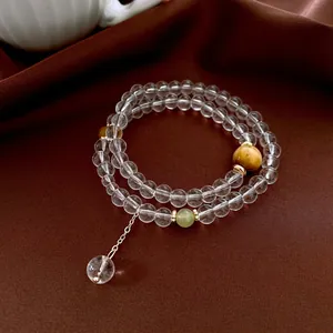 Tiger eye and white crystal beaded multi-layer bracelet with gold metal chain accent