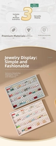 Detailed macro view of high-capacity velvet jewelry tray with multi-slot earring organizers