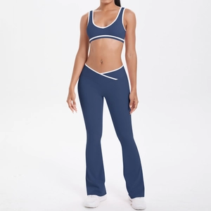 Close-up of contrast binding on two-piece yoga set with cross high waist flared leggings