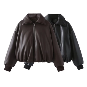 Detail of dark brown and black faux leather jackets with stand collars and zip-up design