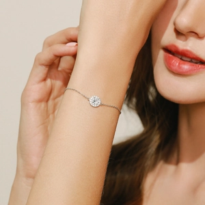 Elegant S925 sterling silver halo bracelet with sparkling diamonds on a woman's wrist