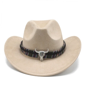 Beige suede western cowboy hat with ethnic woven band and silver steer skull ornament