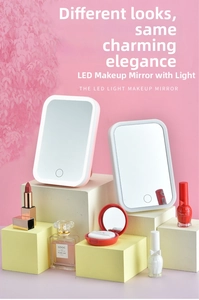 Detail of pink and white LED makeup mirrors with smart touch sensors on a vanity setup