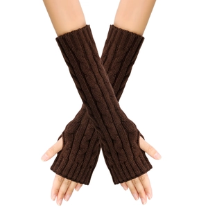 Detailed cable knit pattern on dark brown long fingerless arm warmers for autumn