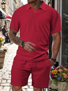 Detailed texture of men's red leisure set showing vertical stripe jacquard fabric finish