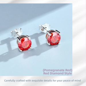 Macro shot of S925 sterling silver stamp and four-prong garnet stud earring setting