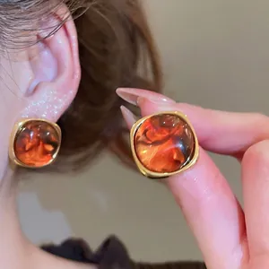 Retro square amber resin stud earrings with gold metal frame for women