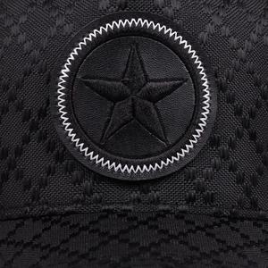 Black mesh baseball cap with jacquard texture and star embroidery patch detail