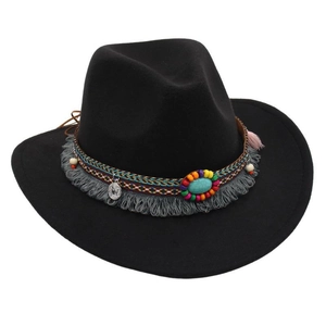 Detail of ethnic western felt hat with turquoise stone, colorful beads and fringe trim