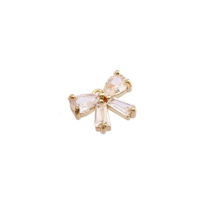 Golden bow pendant charm with inlaid zircons and star accents for DIY jewelry making