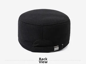 Detail view of the back of a black cadet cap showing the adjustable metal strap buckle