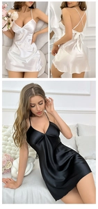 Détail d'une nuisette en satin montrant les bretelles croisées et le nœud au dos