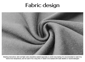 Close-up of gray knitted fabric texture with detailed washing instructions text
