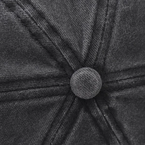 Close-up of the washed dark grey cotton baseball cap crown with stitched panels and top button