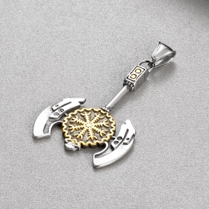 Detailed view of bicolor Viking axe pendant featuring gold Norse Helm of Awe rune