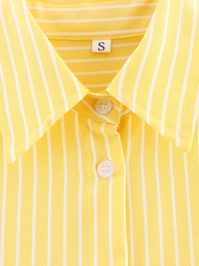 Close-up of a striped yellow shirt collar showing fine fabric texture and size label