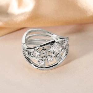 Detailed side view of vintage vine leaf ring with multilayered hollow lines and cubic zirconia