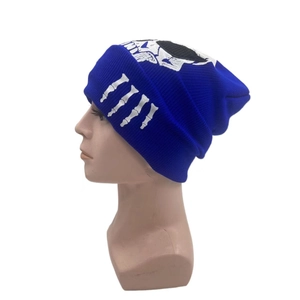Royal blue knitted skull beanie with HELL print for winter warmth and punk style