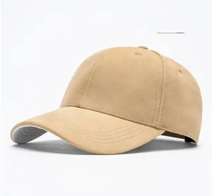 Detailed view of beige corduroy baseball cap showing fine vertical ribbed texture