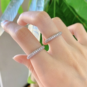 Close-up of S925 sterling silver eternity bands with micro-pave cubic zirconia stones