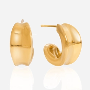 Macro detail of high-polish 18K gold-plated C-shaped stainless steel hoop earrings