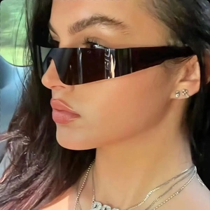 Futuristic rimless shield sunglasses with black lenses and wide temples for women