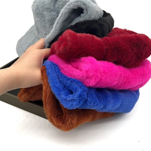 Detailed view of warm plush bucket hats in multiple colors for autumn and winter