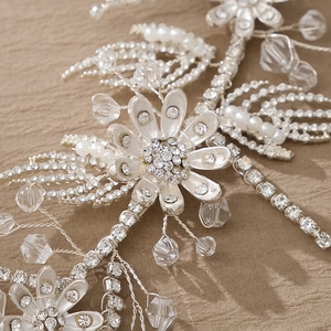 Silver flower hairband with crystals and pearls for bridal hairstyles