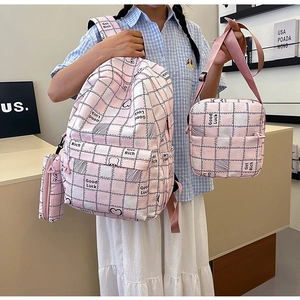 Three-piece pink plaid school backpack set with crossbody bag and pencil pouch