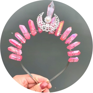 Handmade silver crown headband featuring pink crystal points and a hollow moon centerpiece