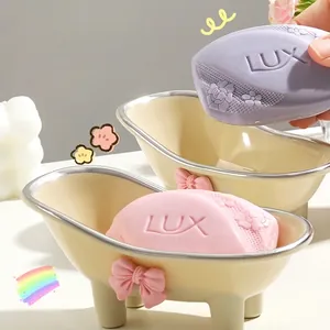 Creative bathtub-shaped soap dish with pink bow and silver trim for bathroom countertop