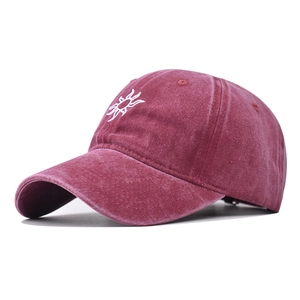 Vintage washed cotton baseball cap in deep red with white sun embroidery for outdoors