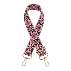 Ethnic style adjustable woven bag strap with pink geometric patterns and gold metal hooks
