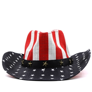Detail of straw cowboy hat featuring American flag pattern and gold star band
