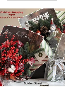 DIY Christmas bouquet wrapping paper with festive patterns, roses and holiday decorations