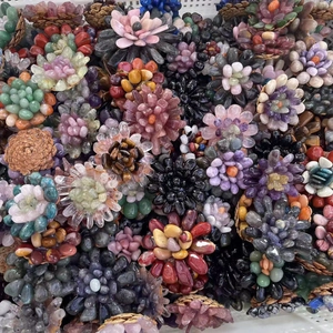 Top-down view of handmade colorful semi-precious stone tumbled flower decorations