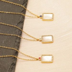 Gold necklace set with square shell pendants and multicolored cubic zirconia stones