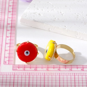 Anelli colorati malocchio in rosso e giallo con finitura in rame placcato oro