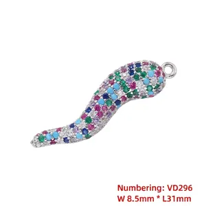 Detailed macro view of S-shaped chili pendant with multicolor zircon inlay and 31mm length