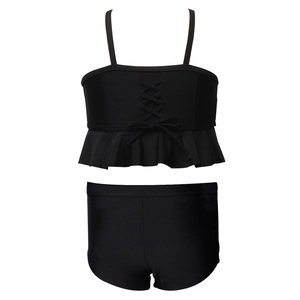 Two-piece black girls' swimsuit featuring criss-cross back bow and ruffled hem detailing