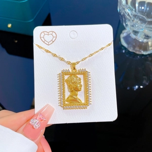Luxurious gold-plated titanium necklace with a portrait pendant and sparkling zircon stones